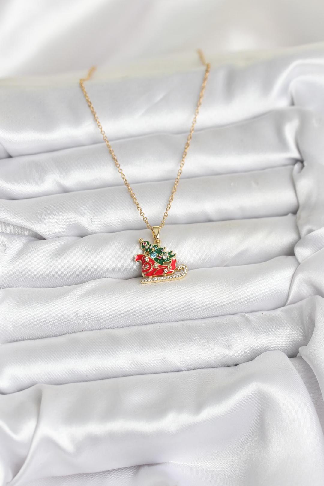 Çelik Zincir Gold Renk Kızak ve Çam Ağacı Figürlü Yılbaşı Temalı Kadın Kolye